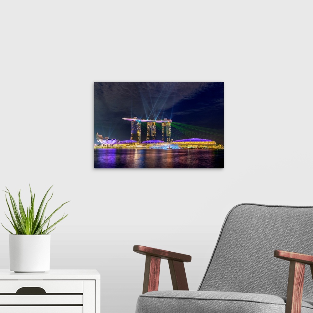 A modern room featuring Marina Bay Sands Light and Water Show, Singapore.