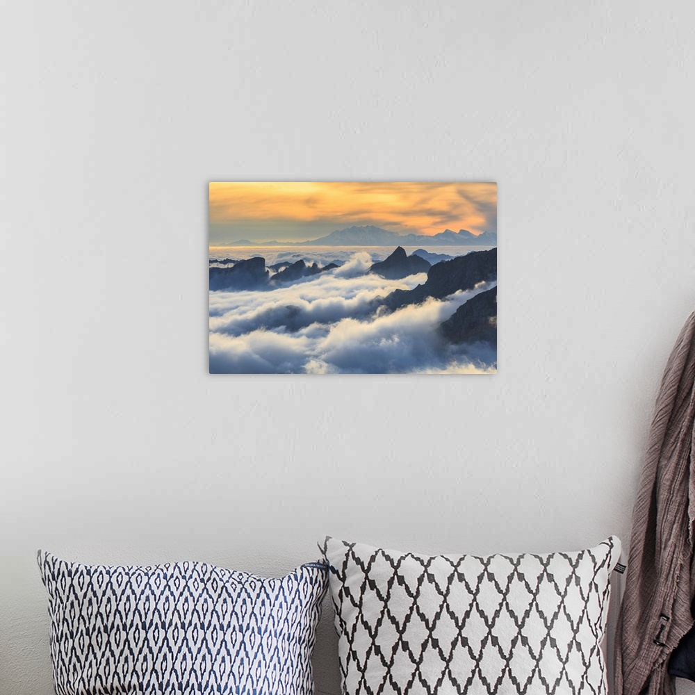 A bohemian room featuring Masino Valley, Low Clouds At Sunset, In The Background Rosa Mountain, Lombardy, Italy