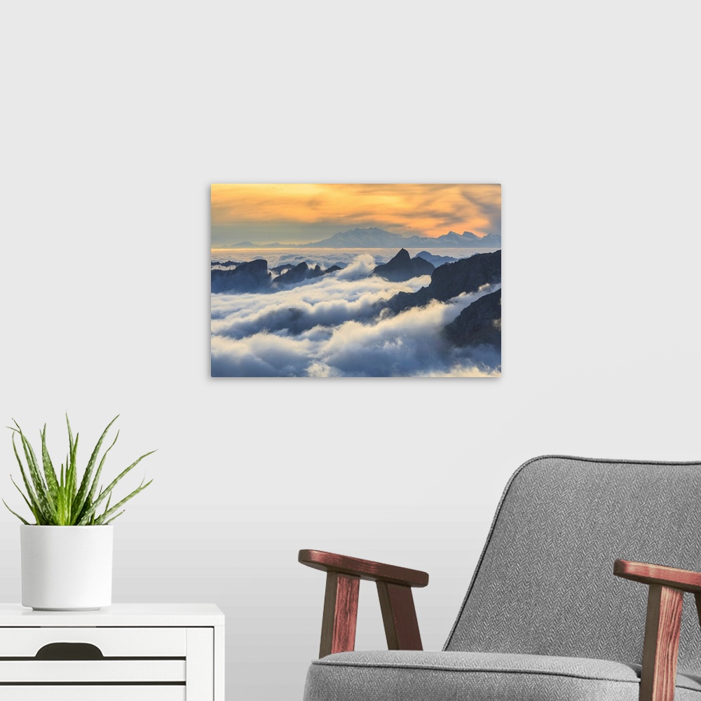 A modern room featuring Masino Valley, Low Clouds At Sunset, In The Background Rosa Mountain, Lombardy, Italy