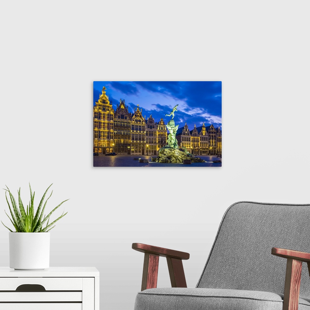 A modern room featuring Belgium, Flanders, Antwerp (Antwerpen). Medieval guild houses and statue of Silvius Brabo on Grot...