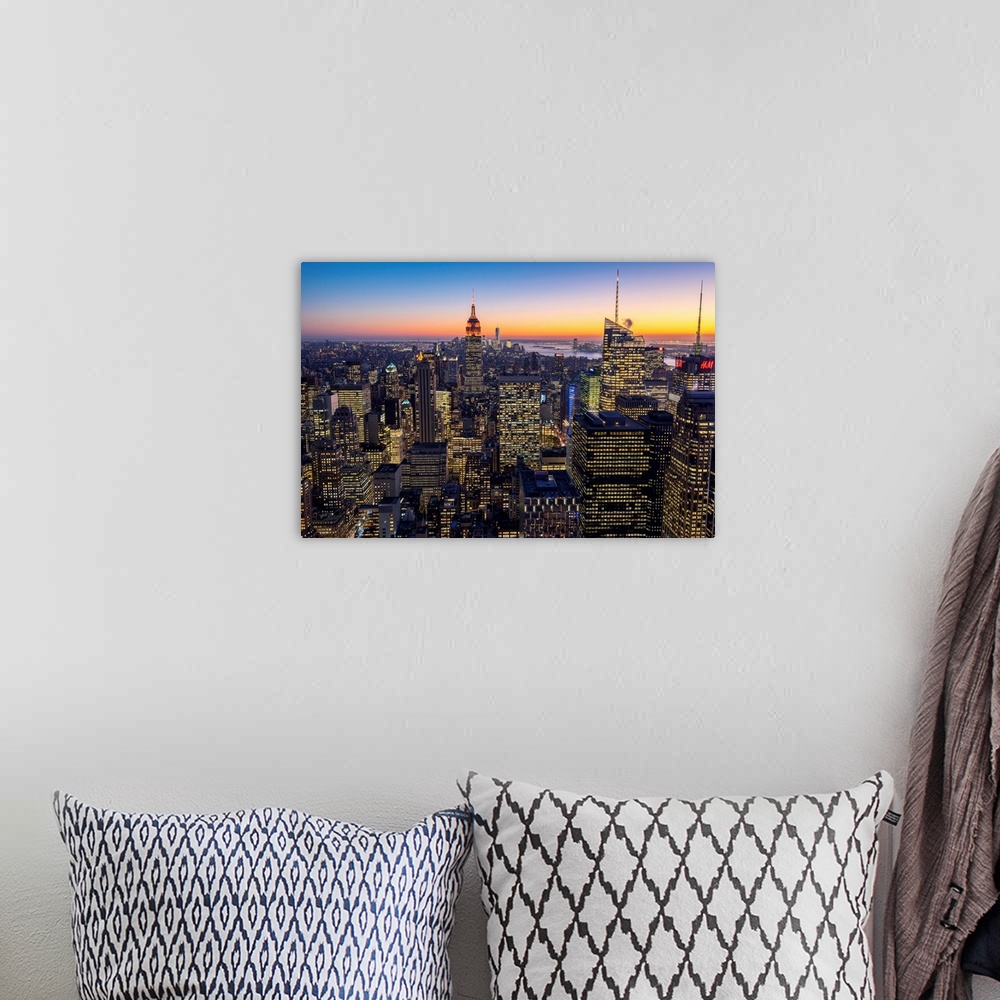 A bohemian room featuring Midtown Manhattan skyline at dusk, New York, USA.