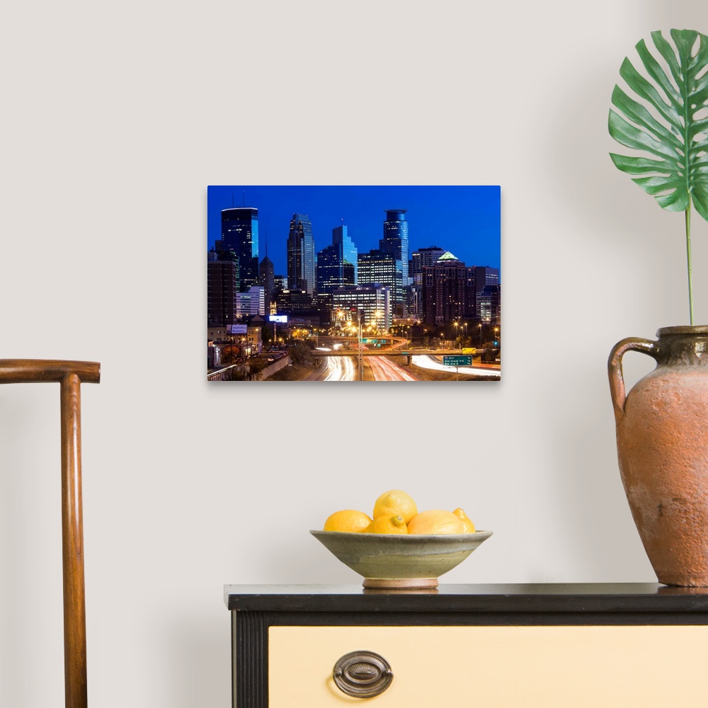A traditional room featuring USA, Minnesota, Minneapolis, city skyline from interstate highway I-35W, dawn