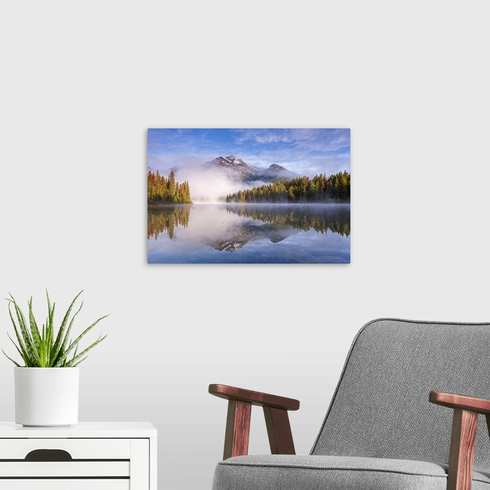 A modern room featuring Mist obscures Pyramid Mountain, reflected in Pyramid Lake in the Canadian Rockies, Jasper Nationa...