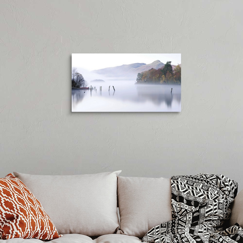A bohemian room featuring Misty morning on Derwent Water, Keswick, Lake District National Park, Cumbria, England, UK. Autum...