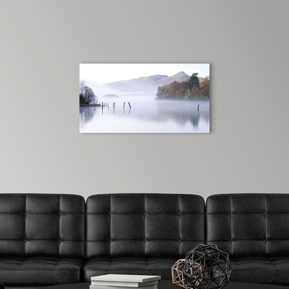 A modern room featuring Misty morning on Derwent Water, Keswick, Lake District National Park, Cumbria, England, UK. Autum...