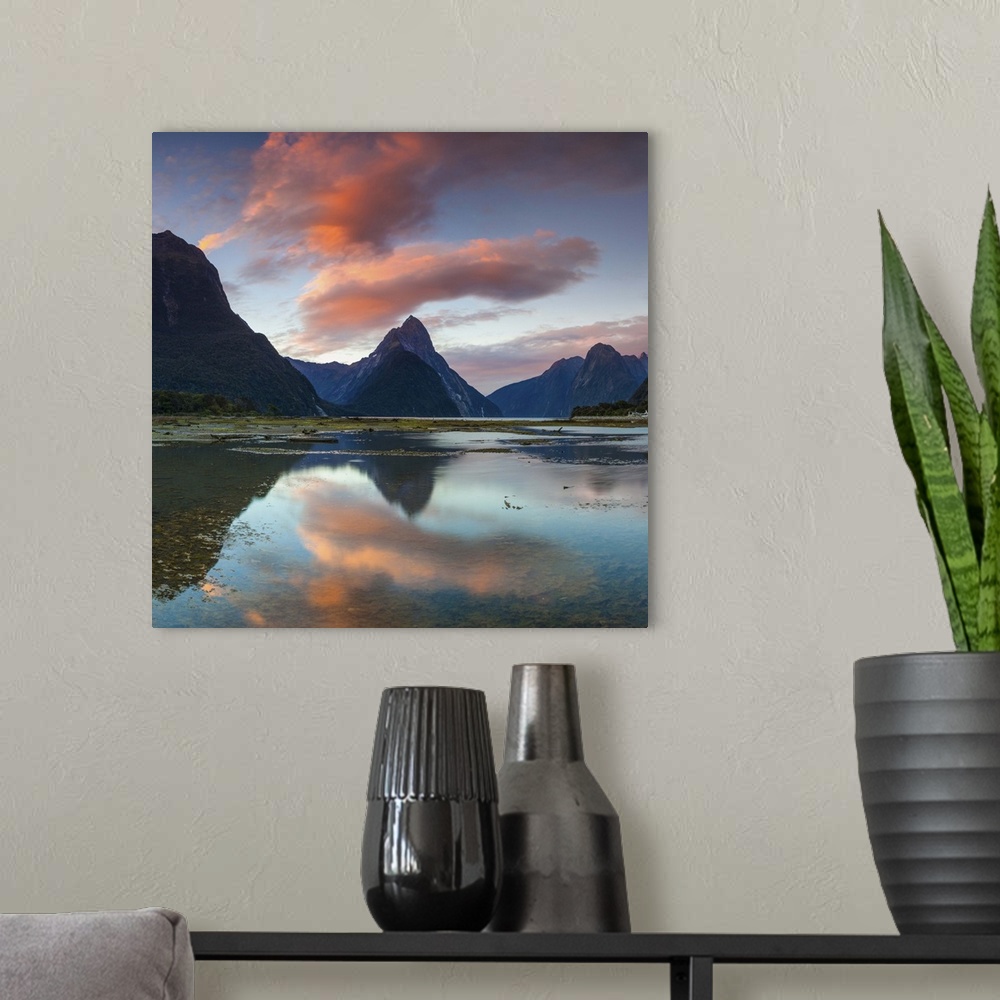 A modern room featuring The dramatic Mitre Peak illuminated at sunset, Milford Sound, Fiordland, South Island, New Zealand