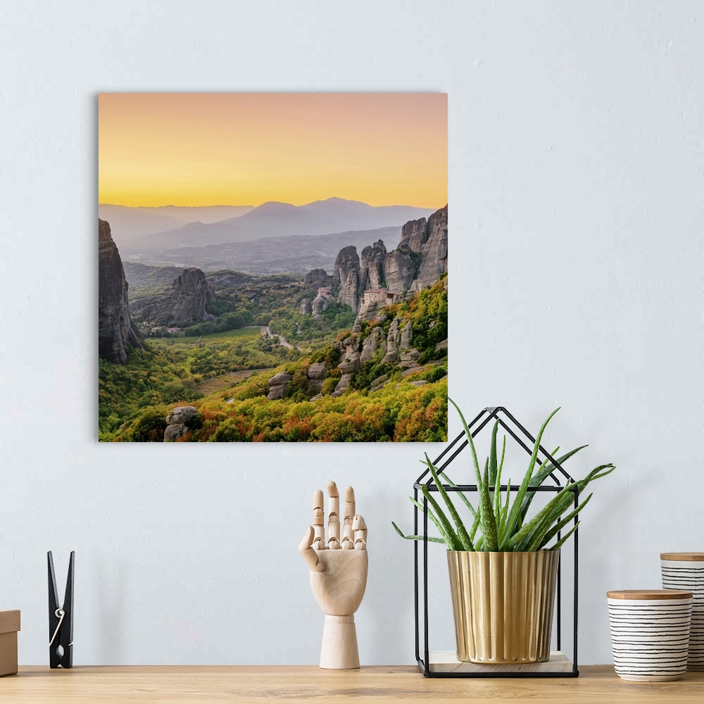 A bohemian room featuring View towards Monasteries of Rousanou and Saint Nicholas Anapafsas at dusk, Meteora, Thessaly, Greece