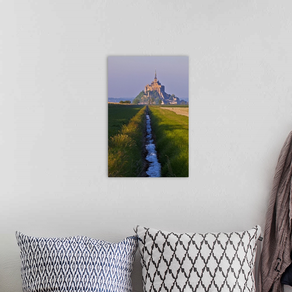 A bohemian room featuring Mont Saint Michel at sunset viewed from a polder and a drainage channel, Le Mont Saint Michel, Ba...