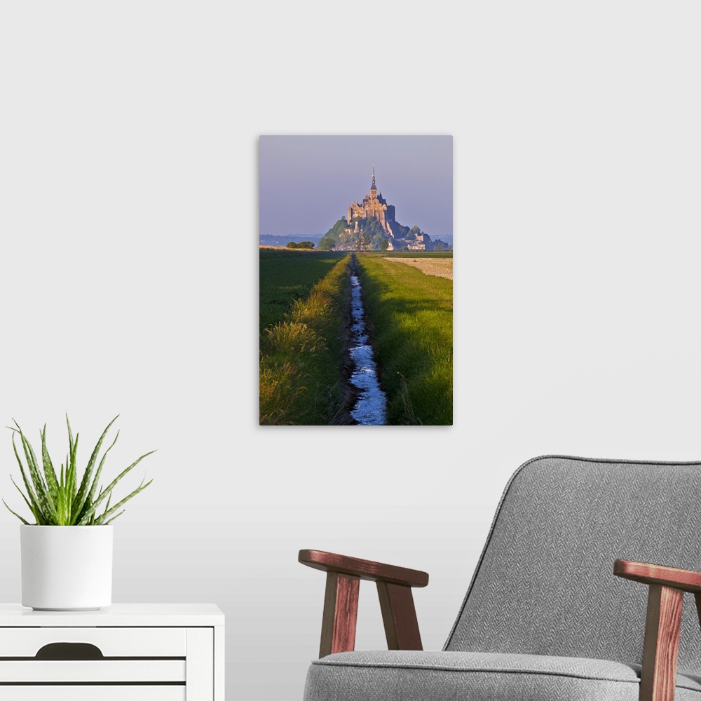 A modern room featuring Mont Saint Michel at sunset viewed from a polder and a drainage channel, Le Mont Saint Michel, Ba...