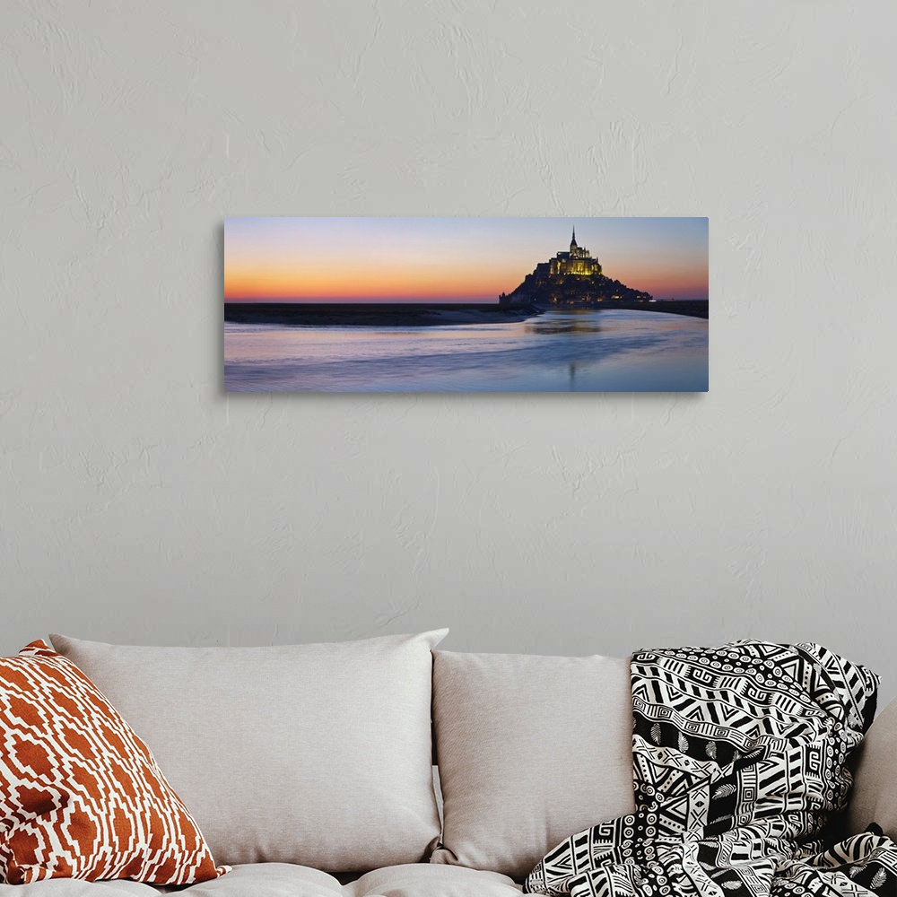 A bohemian room featuring Mont Saint Michel and its connection to the mainland via a tidal causeway with the River Couesnon...