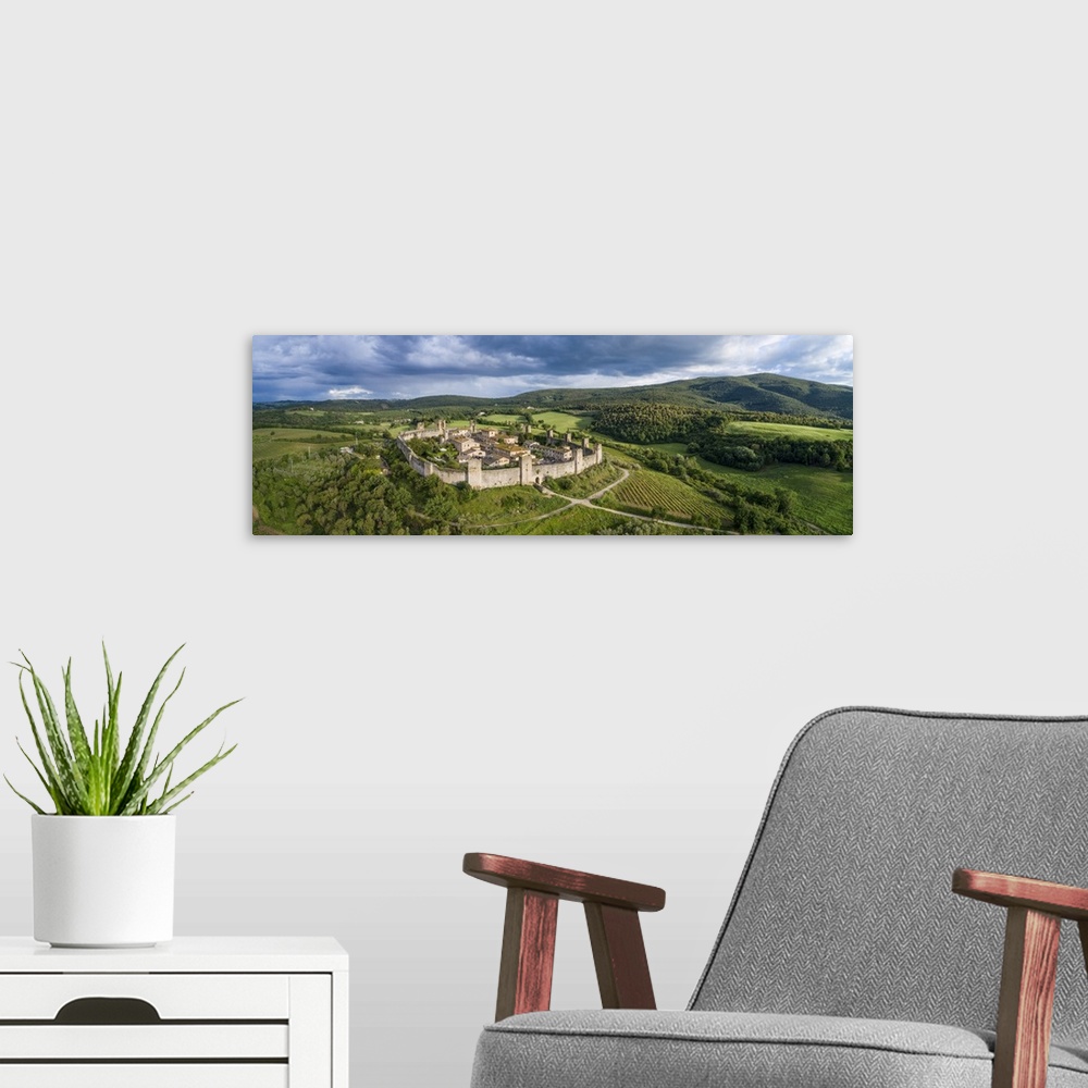 A modern room featuring Monteriggioni village. It is a complete walled medieval town in the Siena Province of Tuscany bui...