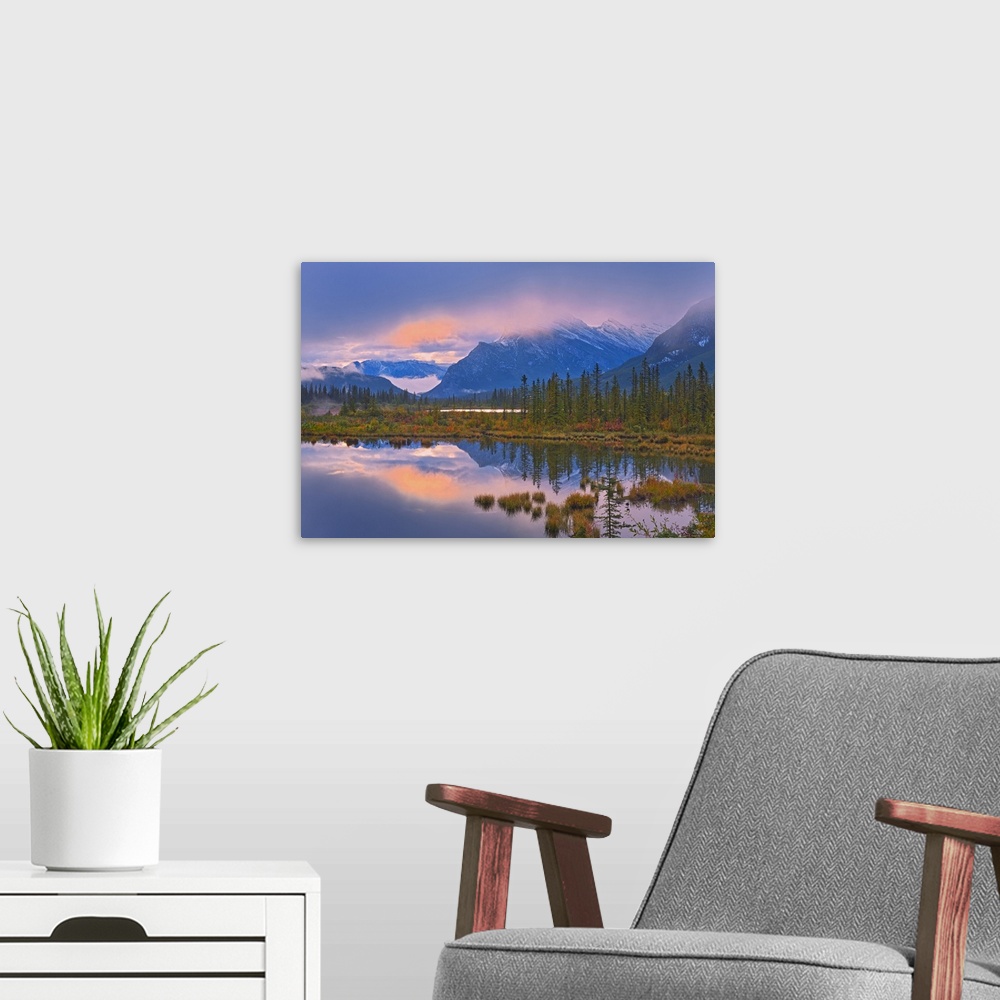 A modern room featuring Morning light peaking through clouds, Banff National Park, Alberta, Canada
