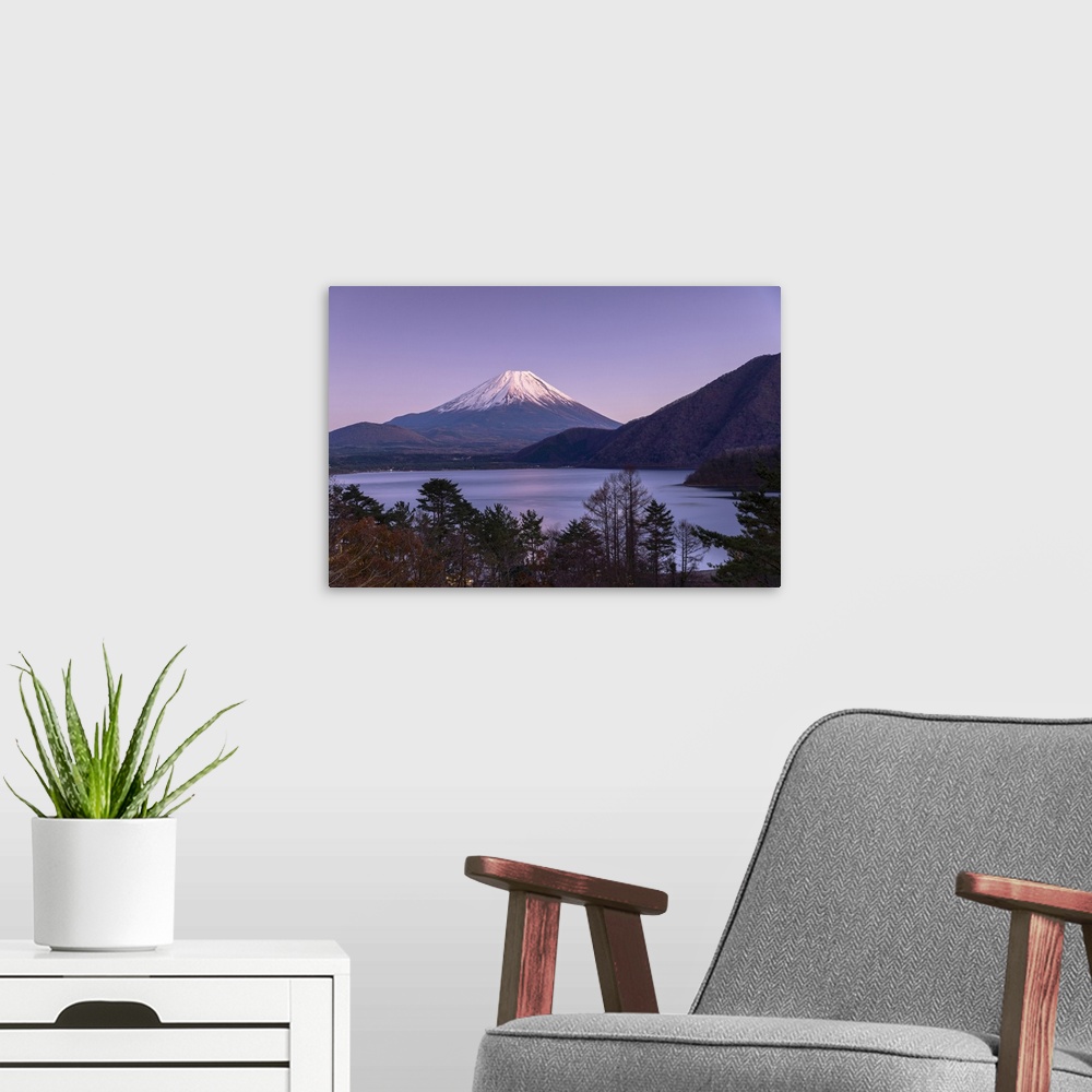 A modern room featuring Mount Fuji and Lake Motosu at dusk, Yamanashi Prefecture, Japan