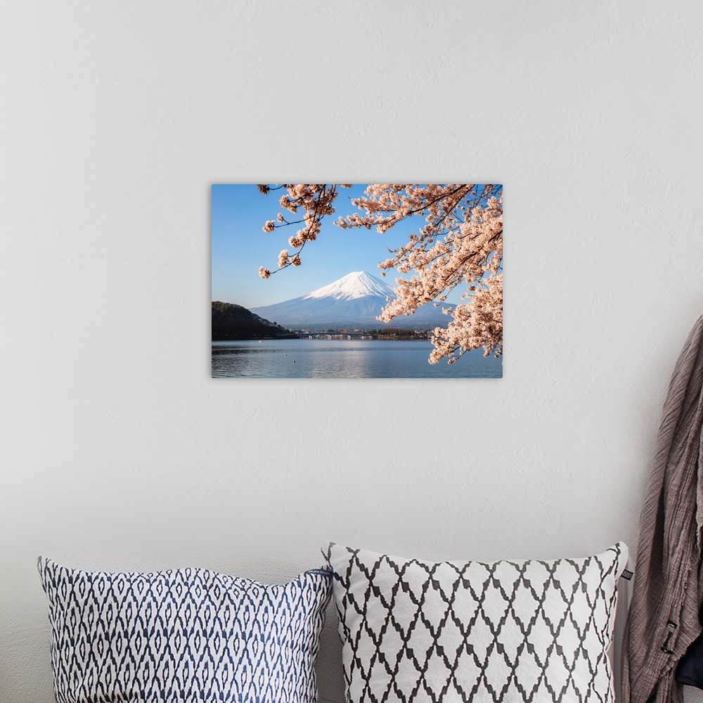 A bohemian room featuring Mount Fuji in springtime with cherry tree in full bloom, Fuji Five Lakes, Japan.