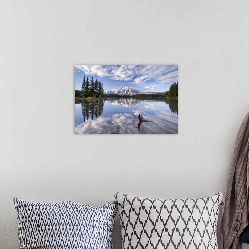 A bohemian room featuring Mount Rundle reflected in Two Jack Lake, Banff National Park, Alberta, Canada.