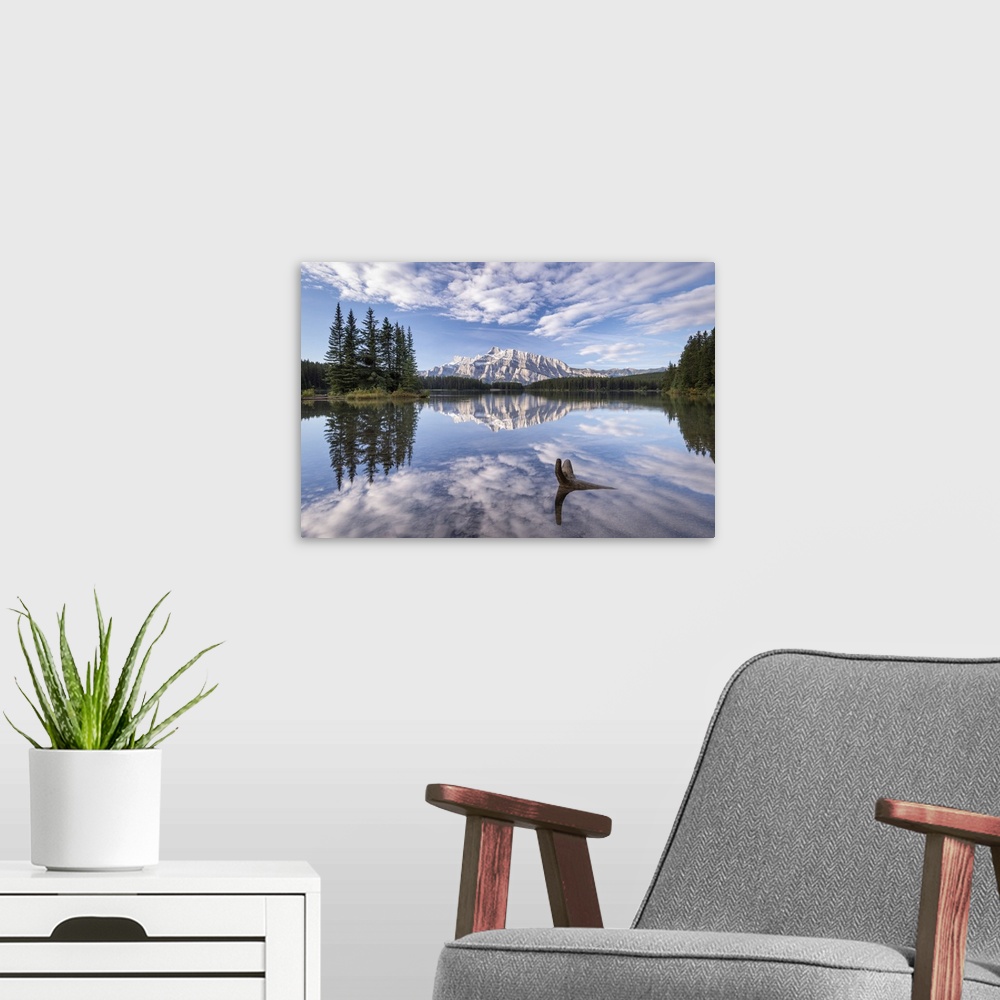 A modern room featuring Mount Rundle reflected in Two Jack Lake, Banff National Park, Alberta, Canada.