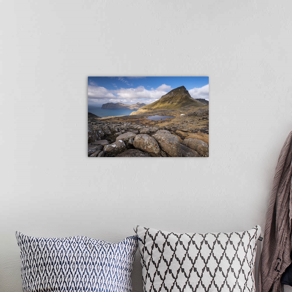 A bohemian room featuring Mountain views from the slopes of Sornfelli in the Faroe Islands, Denmark. Spring (April) 2016