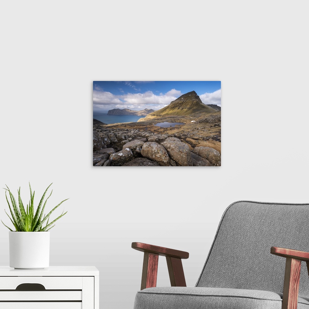 A modern room featuring Mountain views from the slopes of Sornfelli in the Faroe Islands, Denmark. Spring (April) 2016