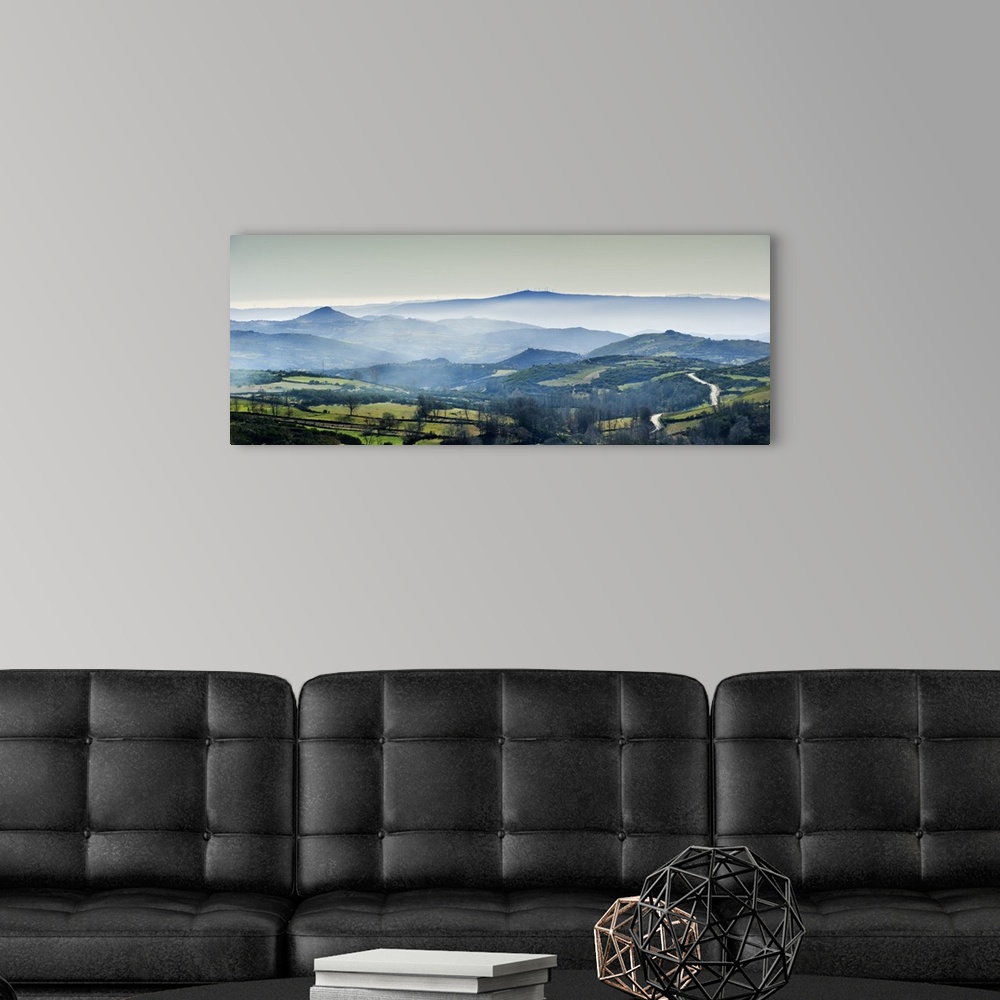 A modern room featuring Mountains in the mist. Alturas do Barroso.