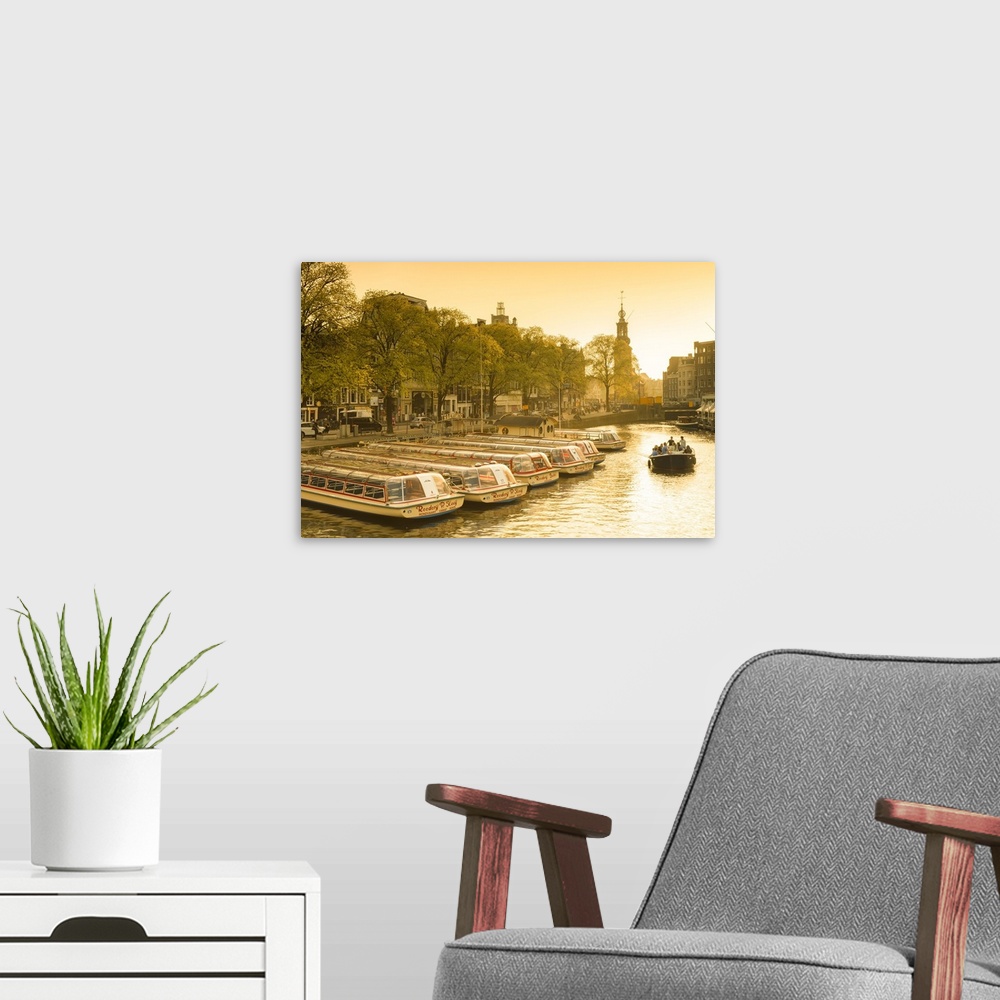 A modern room featuring Munttoren and Amstel River, Amsterdam, Netherlands