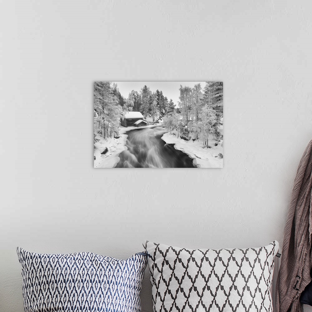 A bohemian room featuring Myllykoski in winter, Kitka River, Kuusamo, Finland. Western Europe, Finland.