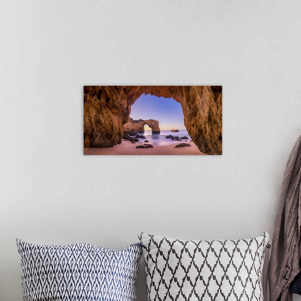 A bohemian room featuring Natural Sea Arch Framed by Cave, Praia da Albandeira, Algarve, Portugal