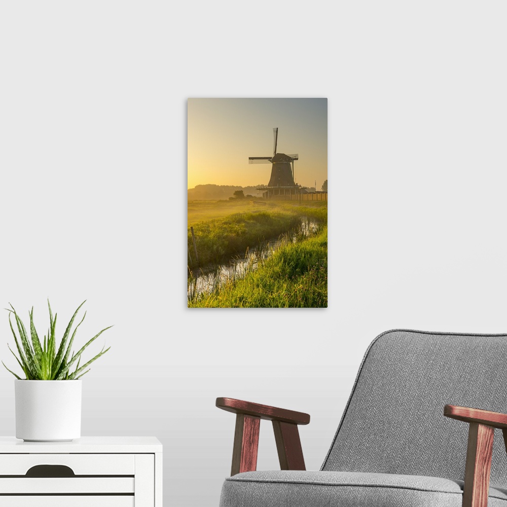 A modern room featuring Netherlands, North Holland, Zaandam, Zaanse Schans, The Seeker (De Zoeker) Oilmill at sunrise
