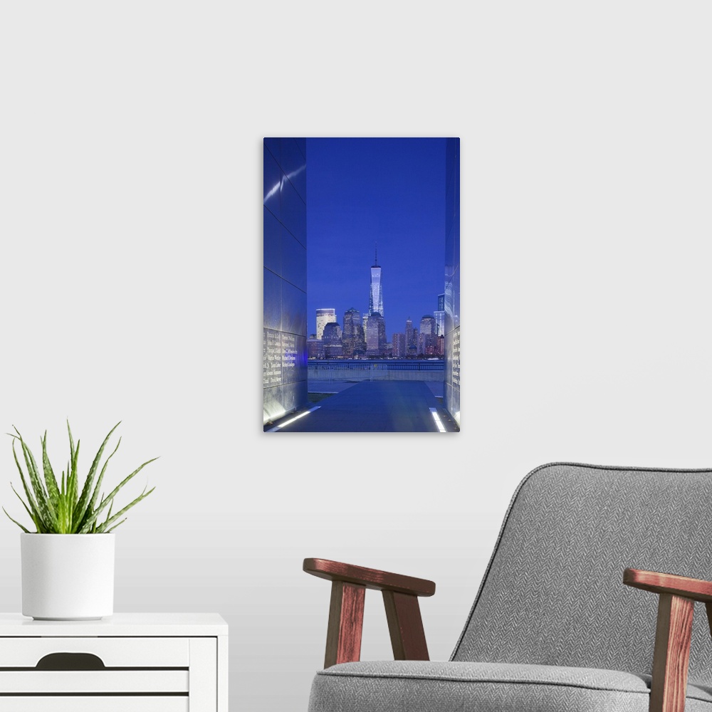 A modern room featuring USA, New Jersey, Jersey City, Liberty State Park, view through 9/11 memorial, Empty Sky, dusk