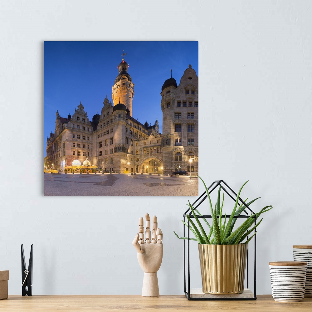 A bohemian room featuring New Town Hall (Neues Rathaus) at dusk, Leipzig, Saxony, Germany.