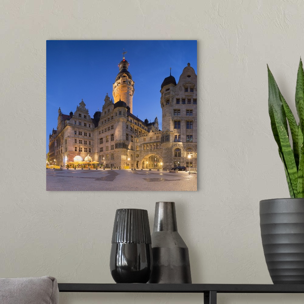 A modern room featuring New Town Hall (Neues Rathaus) at dusk, Leipzig, Saxony, Germany.