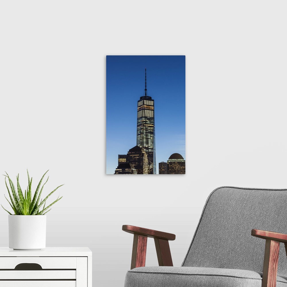 A modern room featuring USA, New York, New York City,  Lower Manhattan skyline with Freedom Tower from Jersey City, dawn