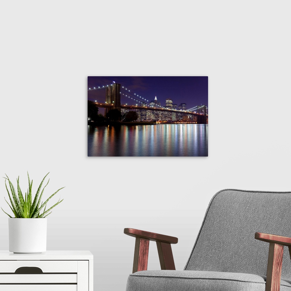 A modern room featuring USA, New York City, Manhattan,  Brooklyn Bridge and the Downtown Manhattan Financial District sky...