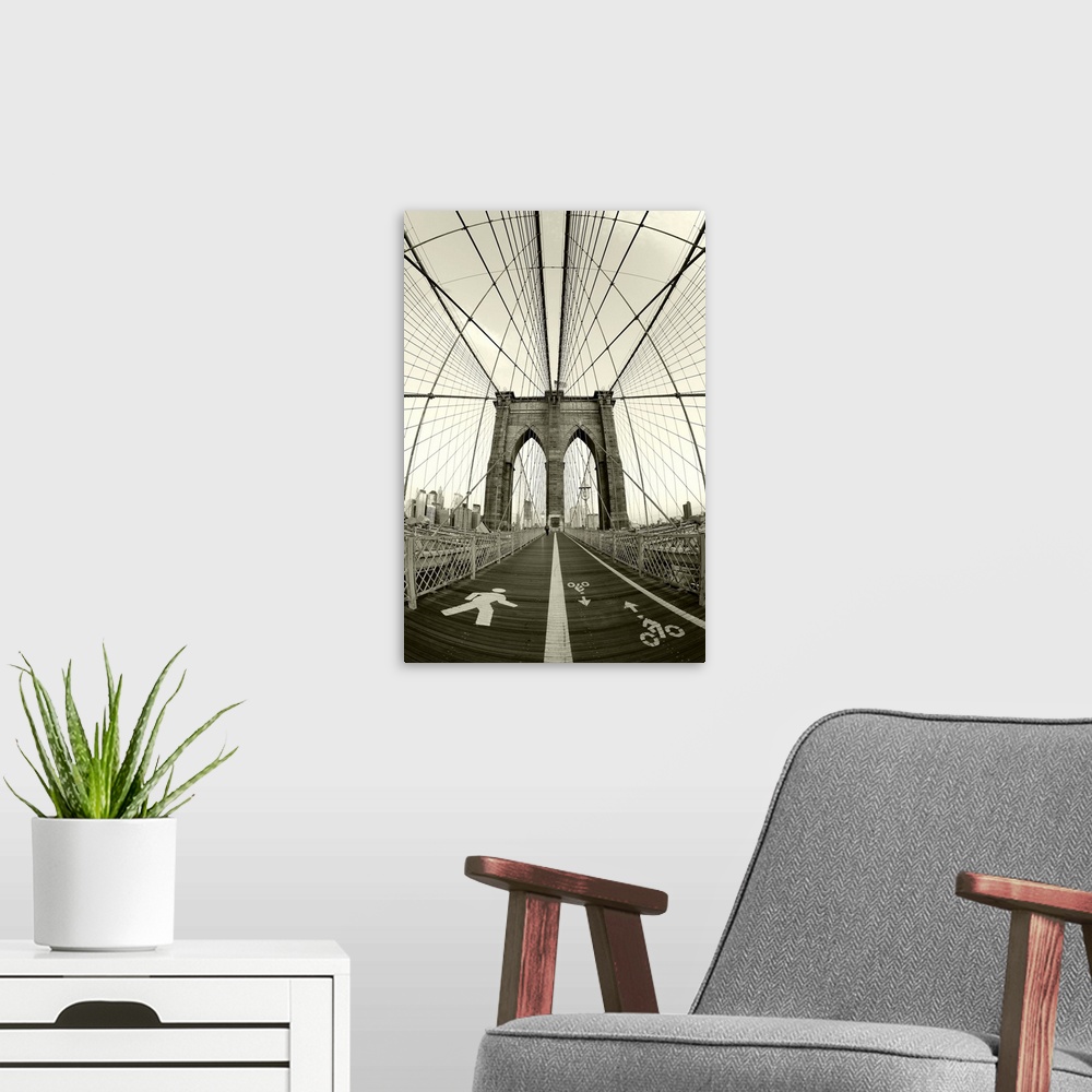 A modern room featuring USA, New York City, Manhattan,  Brooklyn Bridge at dawn