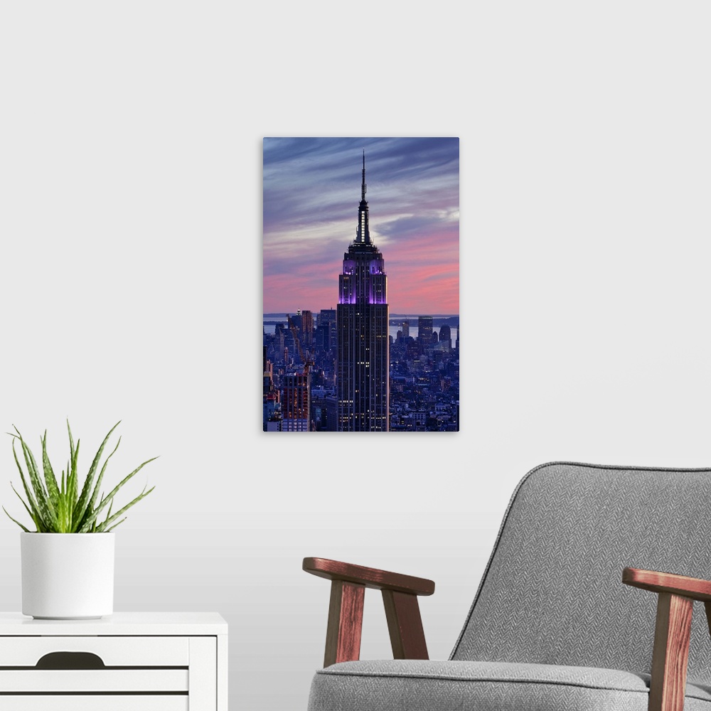 A modern room featuring USA, New York City, Manhattan,  View towards Downtown Manhattan and the Empire State building fro...