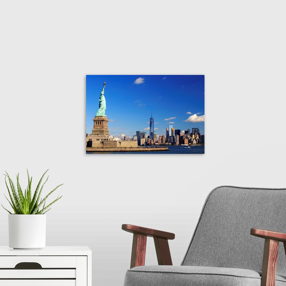A modern room featuring USA, New York, New York City, Statue of Liberty and Lower Manhattan Skyline.