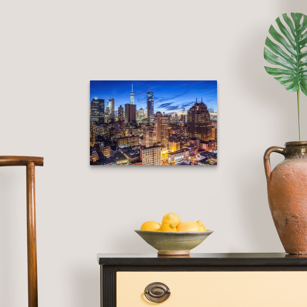 A traditional room featuring USA, New York, New York City, Lower Manhattan, elevated view of SoHo, dusk