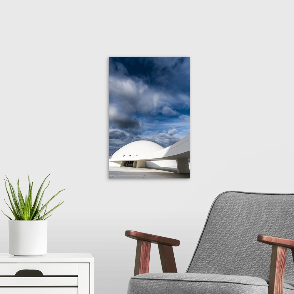 A modern room featuring Niemeyer Center building, in Aviles, Spain, The cultural center was designed by Brazilian archite...
