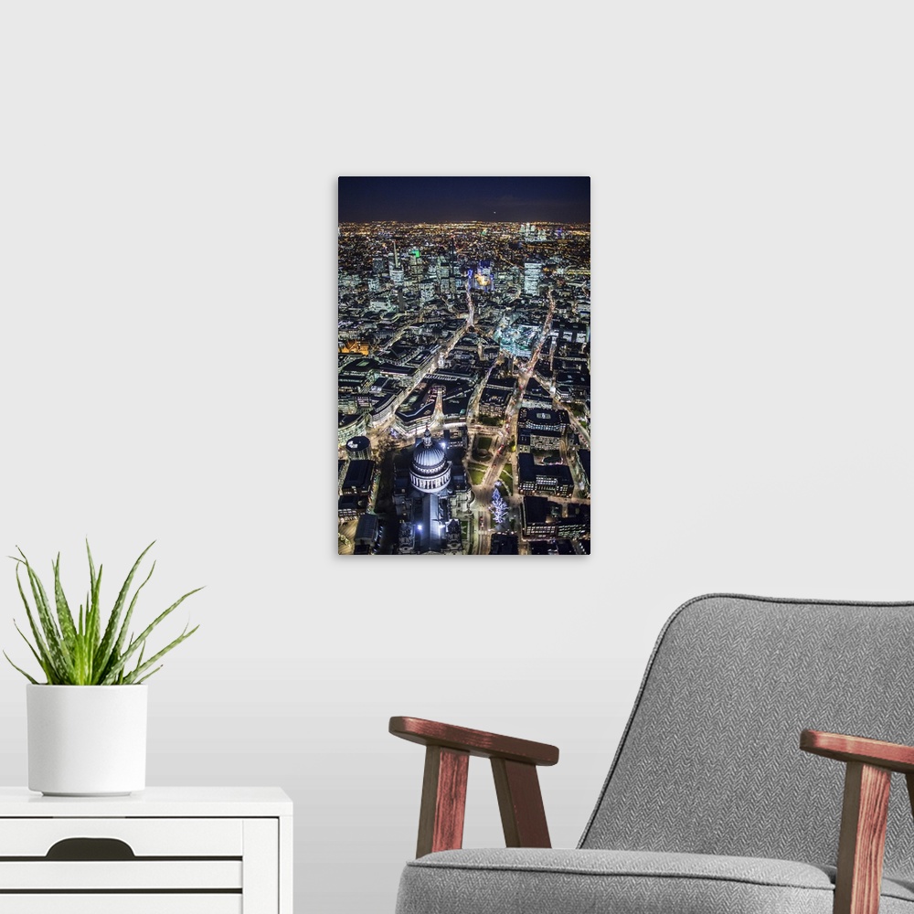 A modern room featuring Night aerial view of St. Paul's and City of London, London, England