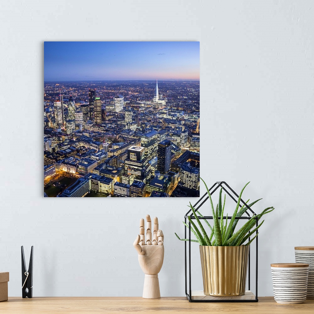 A bohemian room featuring Night aerial view of The Shard and City of London, London, England