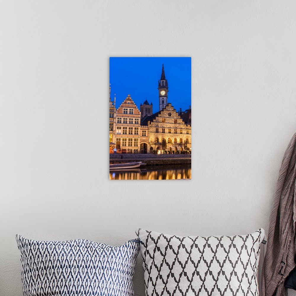 A bohemian room featuring Night view of Graslei quay with Post Plaza tower, Ghent, East Flanders, Belgium