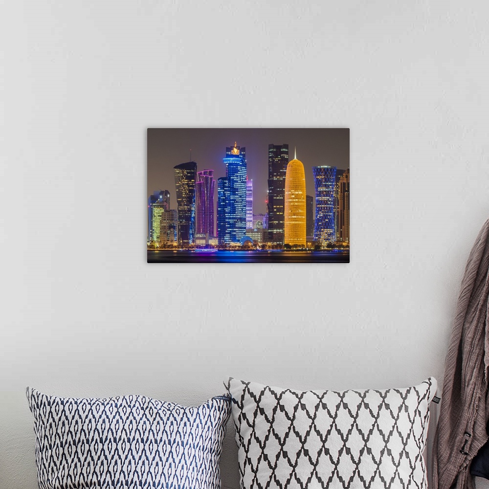A bohemian room featuring Night view of the business district skyline, Doha, Qatar.