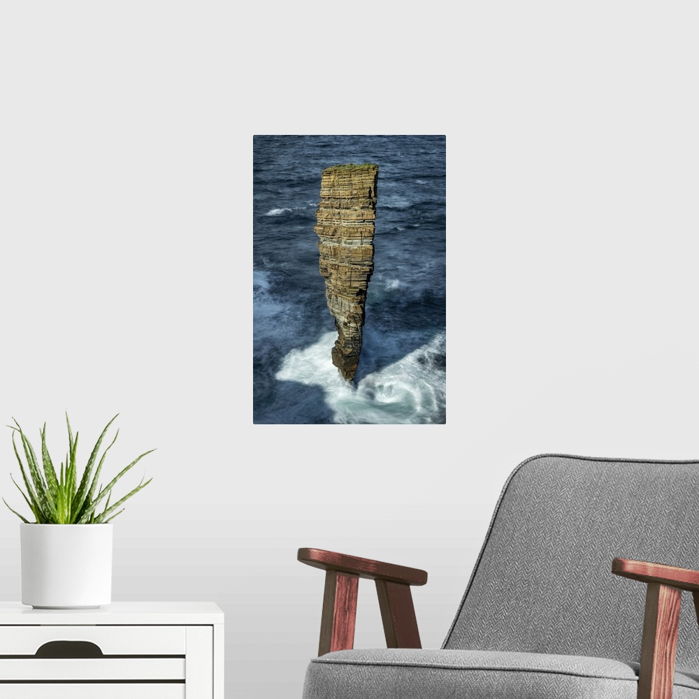 A modern room featuring North Gaulton Castle sea stack on the wild west coast of Mainland, Orkney Islands, Scotland. Autu...