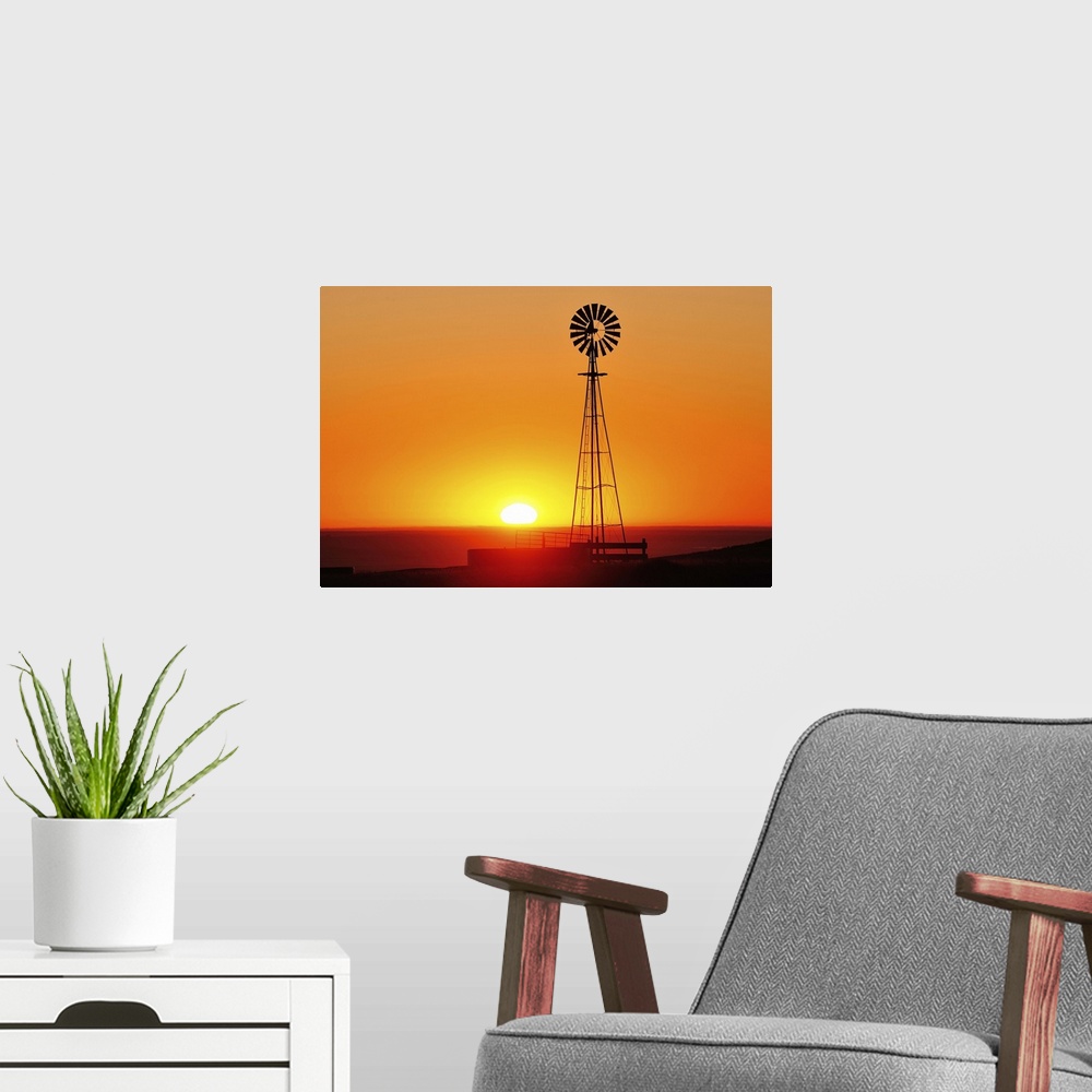 A modern room featuring Old west windmill at sunset, Pawnee National Grassland, Colorado, USA
