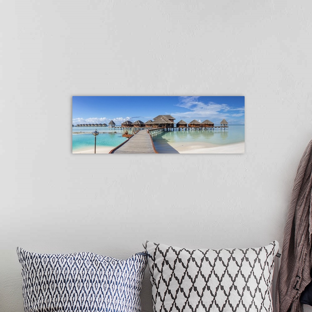 A bohemian room featuring Overwater Spa, Anantara Dhigu resort, South Male Atoll, Maldives.