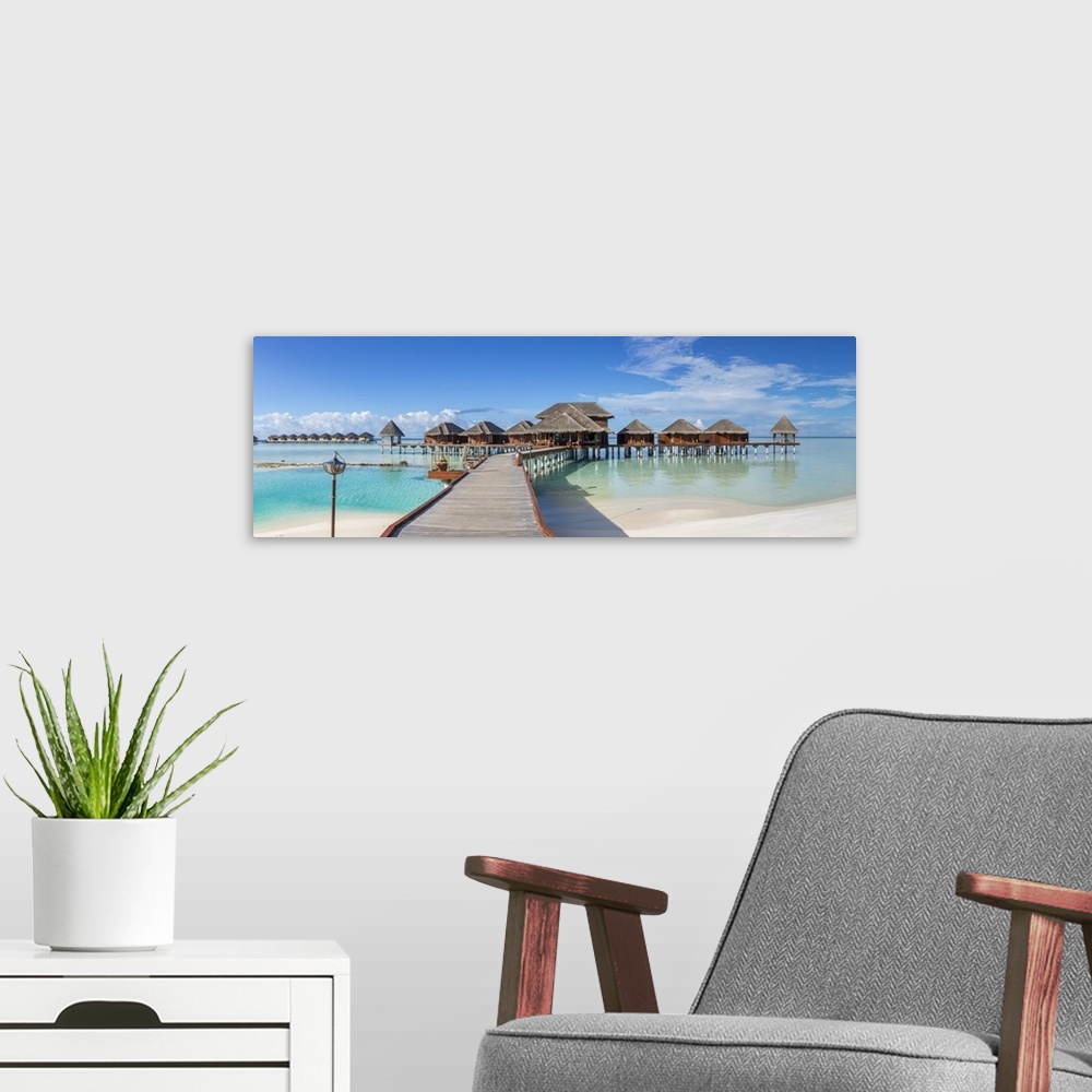 A modern room featuring Overwater Spa, Anantara Dhigu resort, South Male Atoll, Maldives.