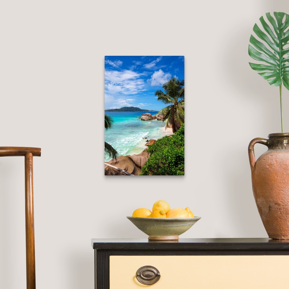 A traditional room featuring Palm trees and tropical beach, La Digue, Seychelles.