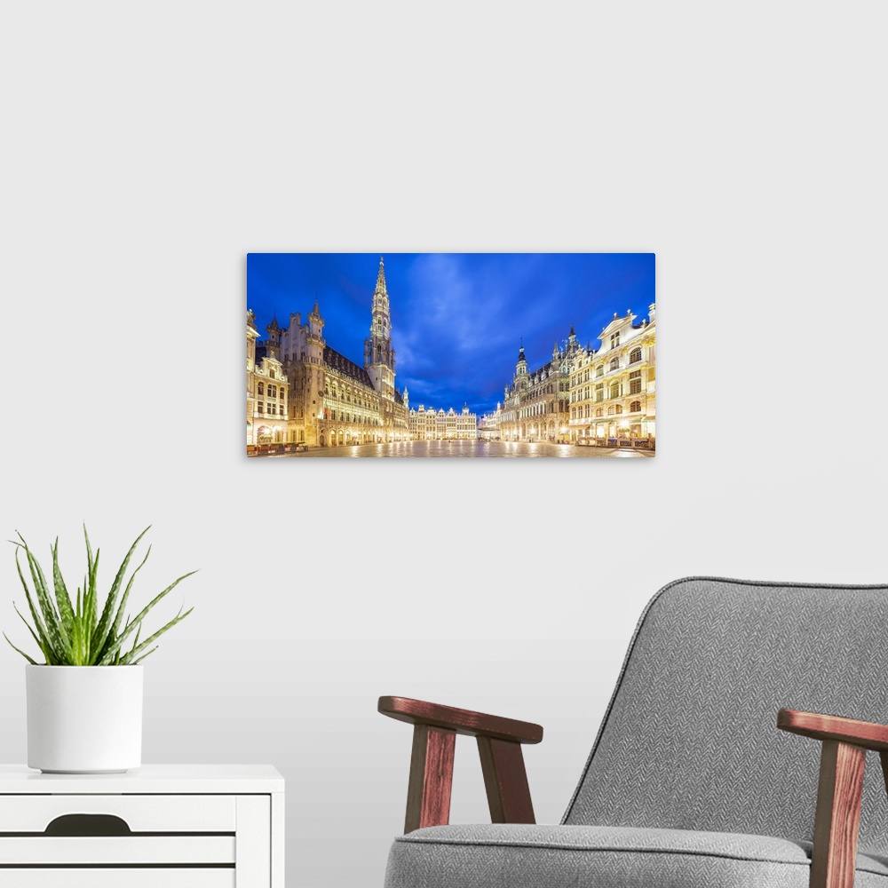 A modern room featuring Panoramic view of Grand Place in Brussels by night, Belgium
