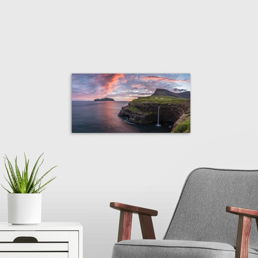 A modern room featuring Gasadalur, Vagar island, Faroe Islands, Denmark. Panoramic view of Mykines and the iconic waterfa...