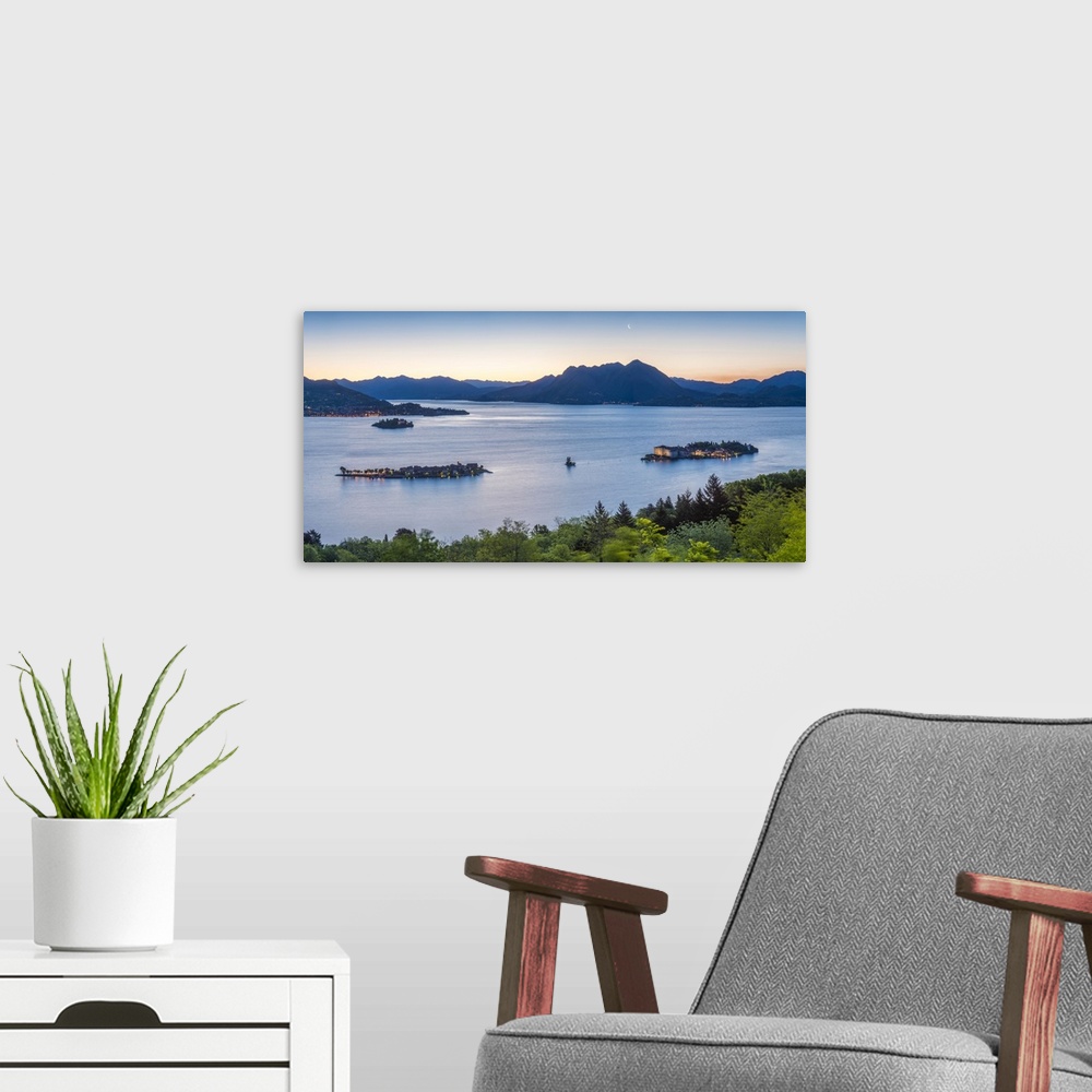 A modern room featuring Borromean Islands, Stresa, Lake Maggiore, Verbano-Cusio-Ossola, Piedmont, Italy. Panoramic view o...