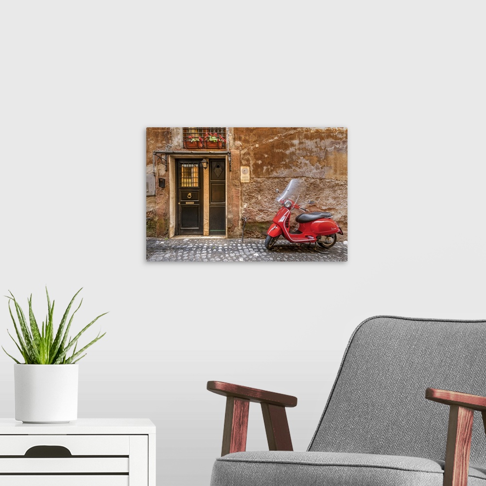 A modern room featuring Parked red Vespa scooter in a cobbled street of Rome, Lazio, Italy